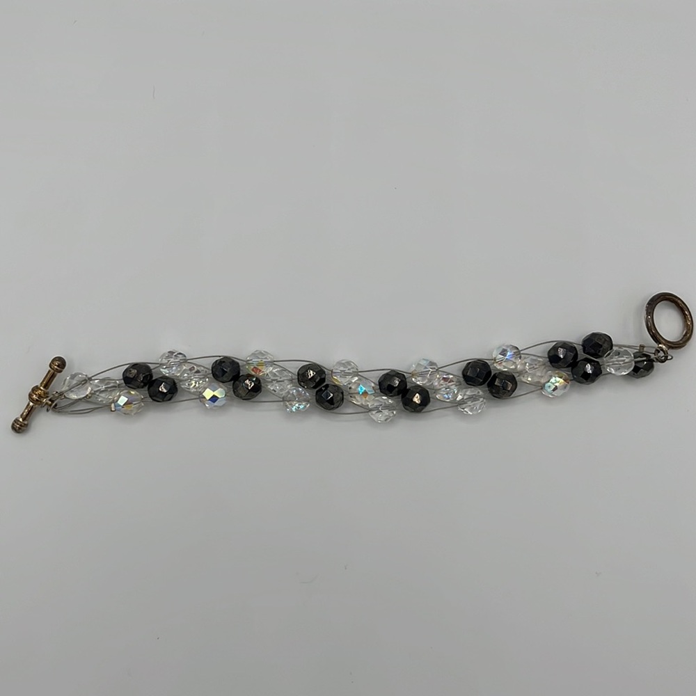 Wire bracelet with clear and black bracelets